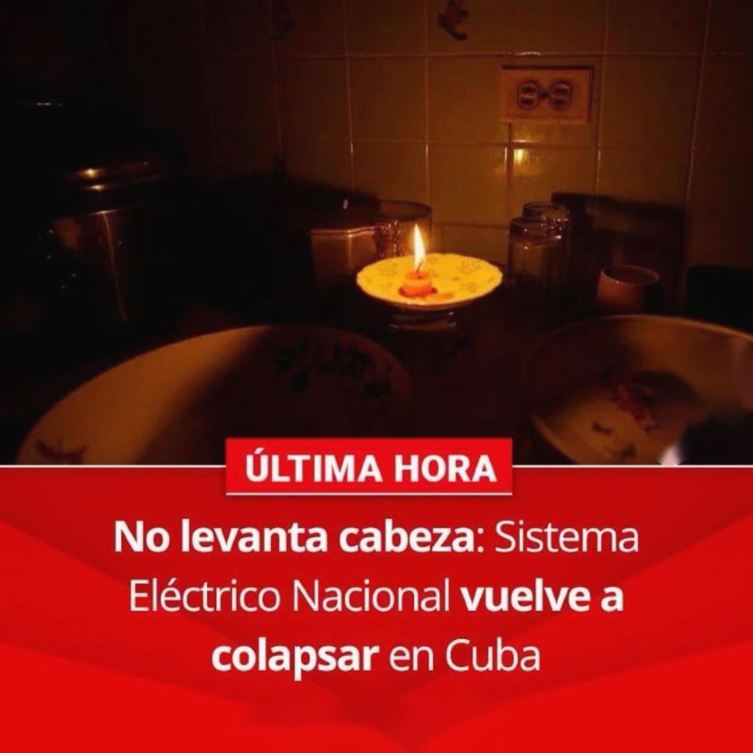 Cocina iluminada por vela, noticia de apagón en Cuba