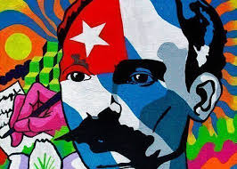 Mural colorido con rostro y bandera de Cuba