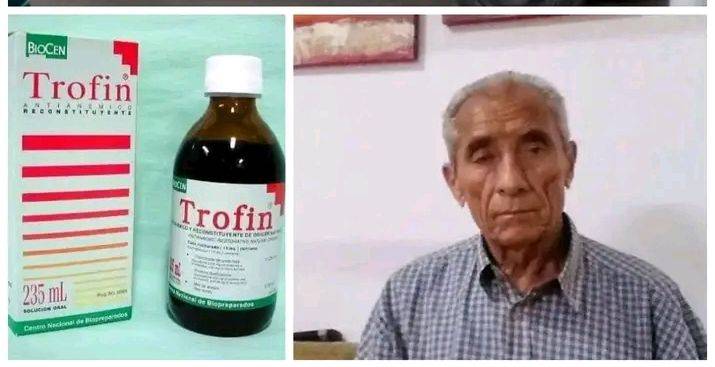 Paquete y botella de Trofin junto a hombre mayor