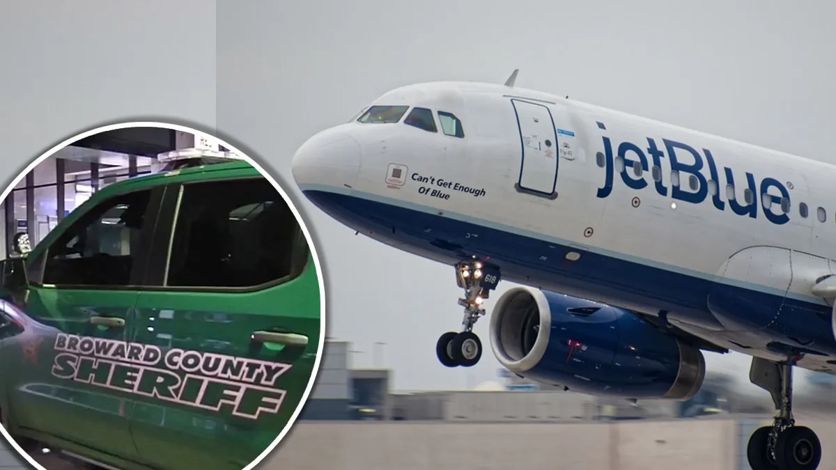 Avión de JetBlue aterrizando; coche de sheriff cercano