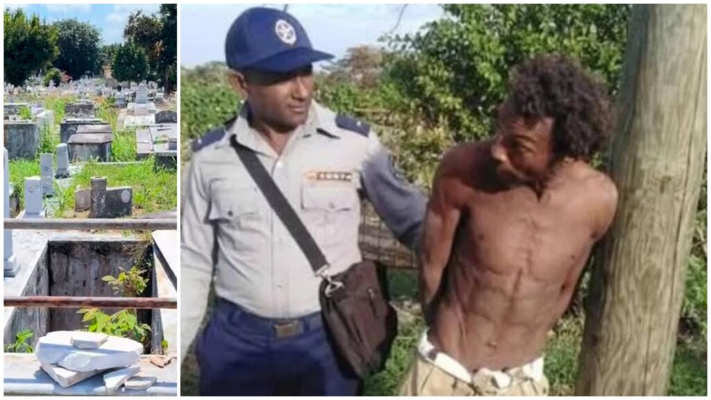 Agente de policía hablando con hombre junto a poste