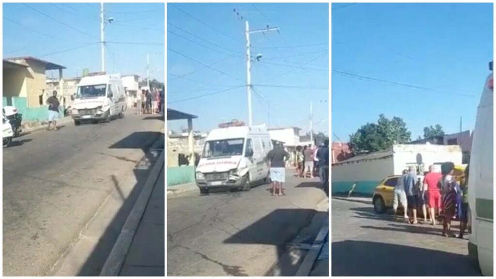 Ambulancia y personas en calle transitada