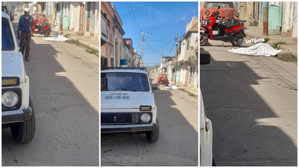Calle de ciudad con vehículos y persona caminando