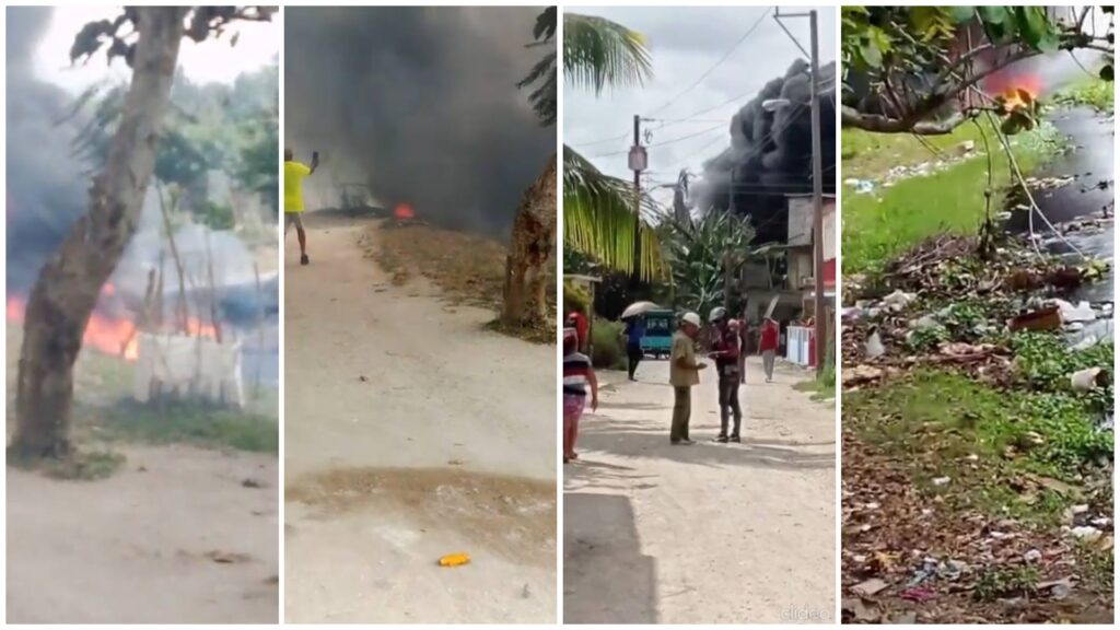 Incendio en un camino rural, humo y llamas visibles.