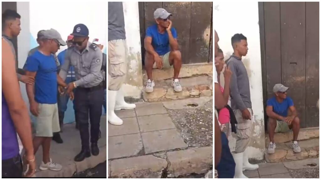 Hombre siendo arrestado en la calle, rodeado de personas.