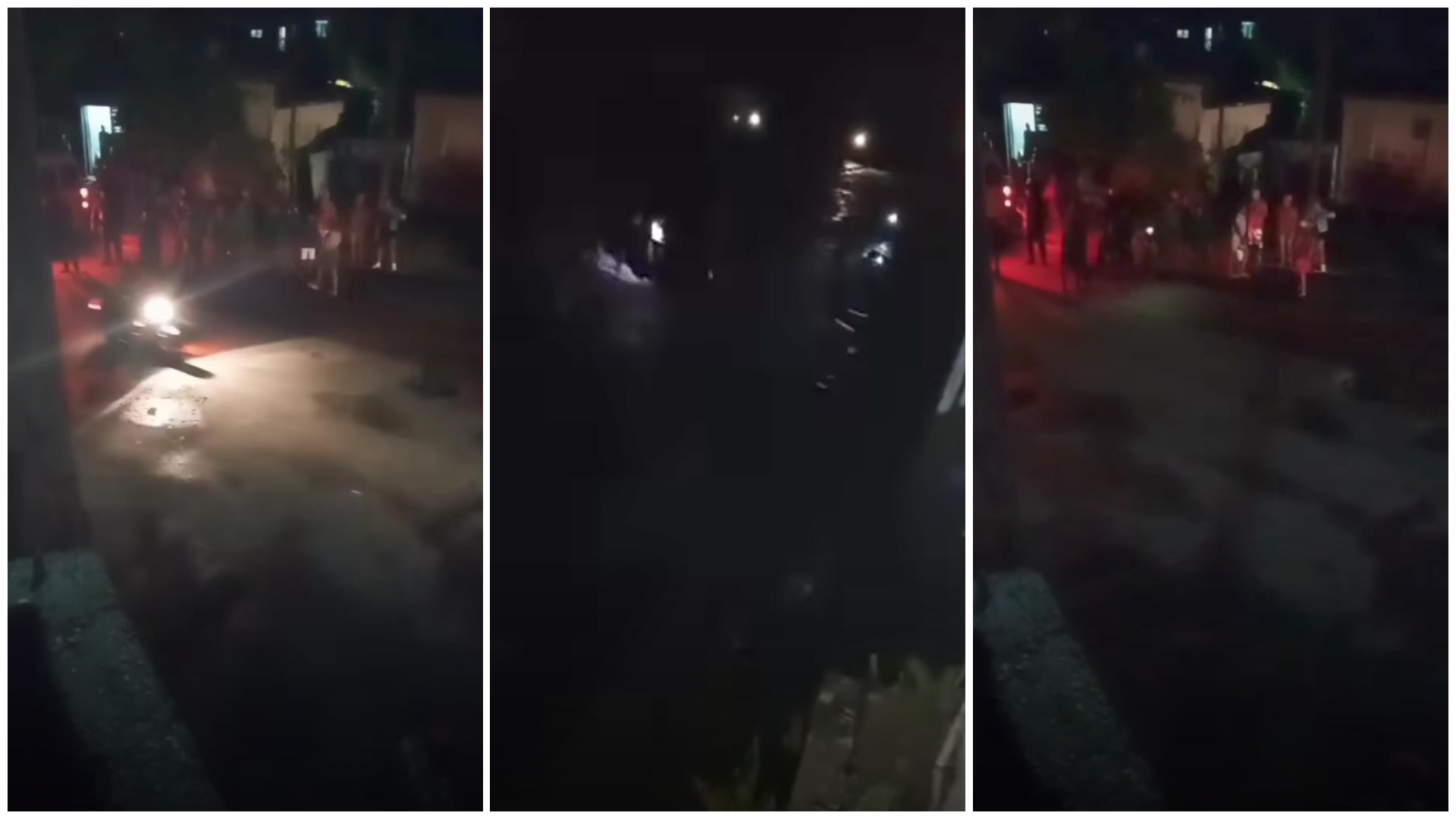 Multitud observa vehículo cruzando río por la noche.