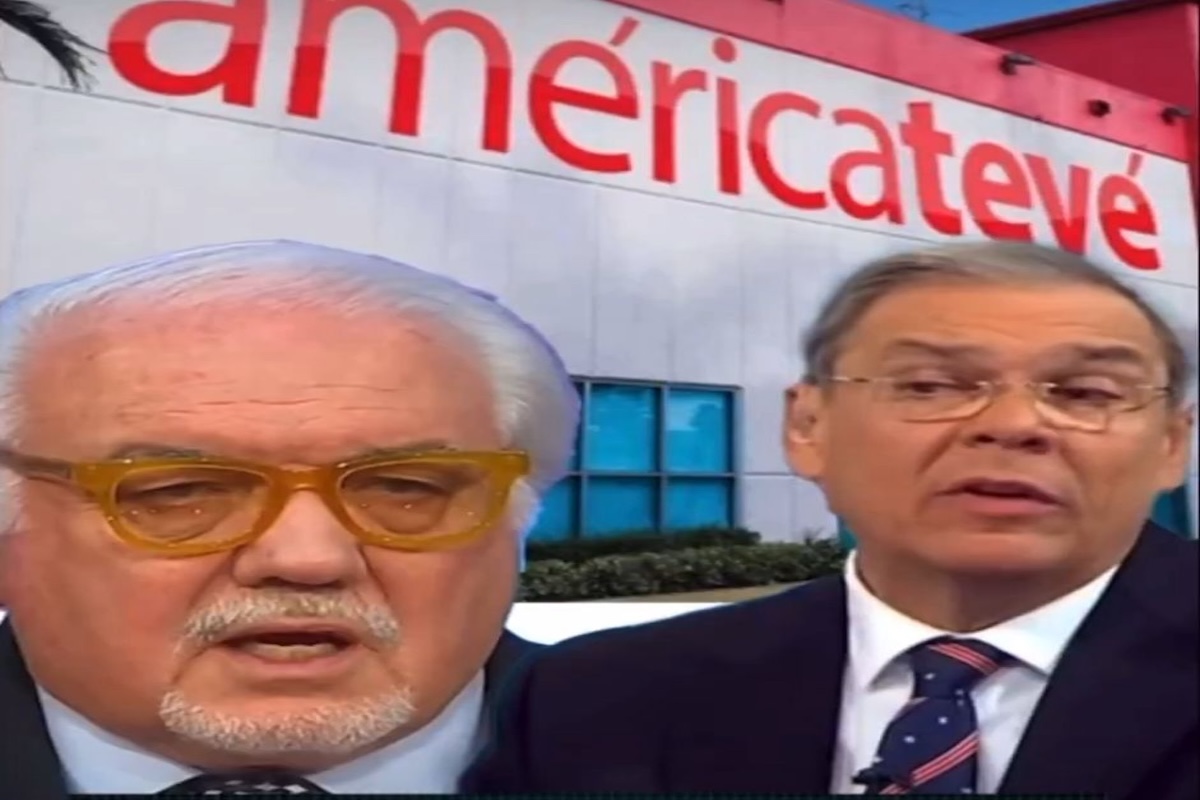 Dos hombres frente a edificio de Americateve.