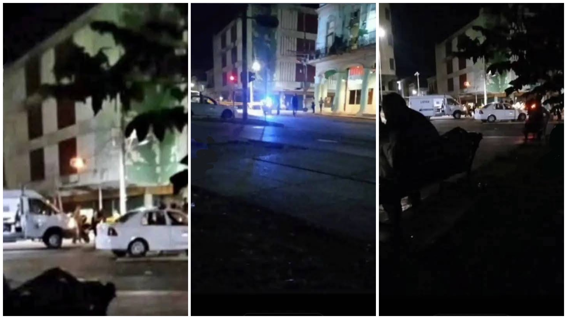 Noche con luces y edificios en calle céntrica