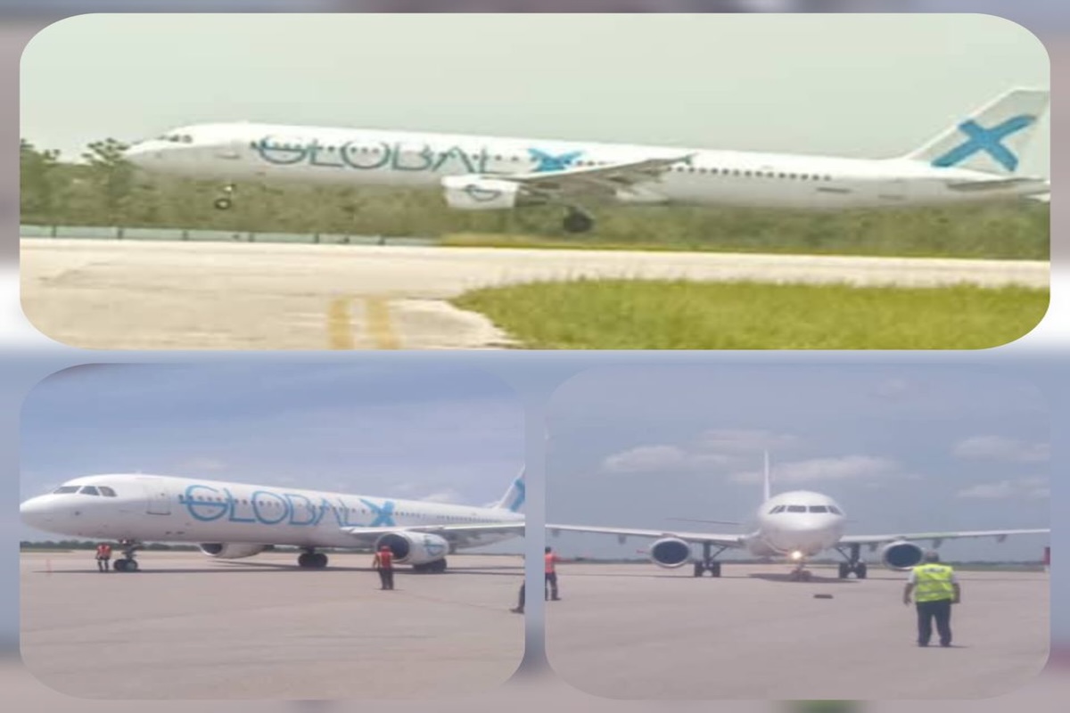 Aviones en pista con personal de tierra cercano