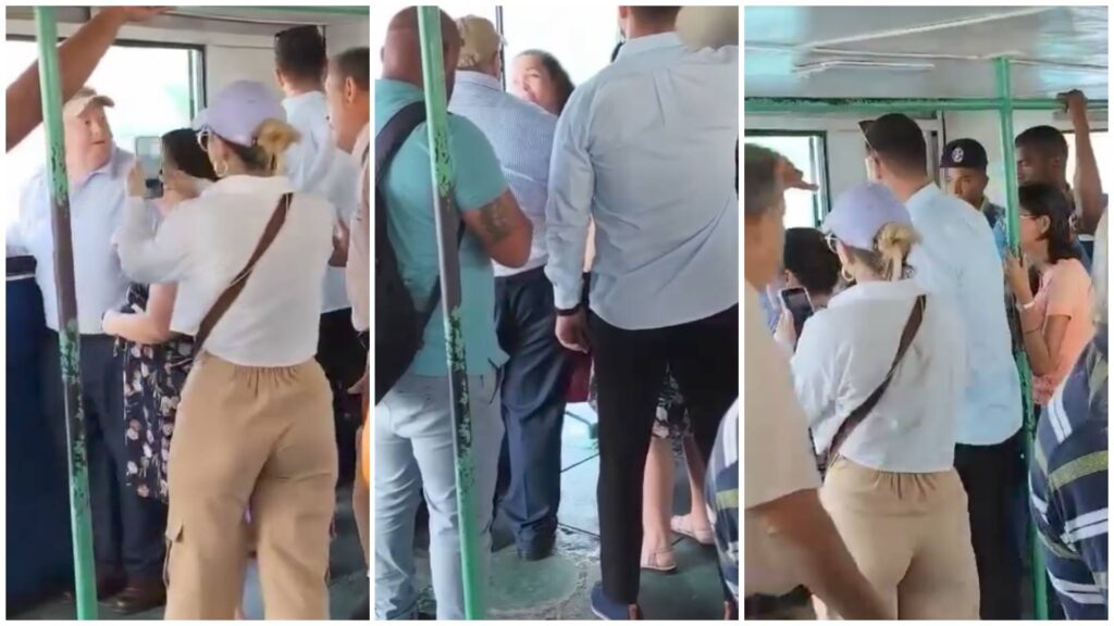 Personas de pie en un transporte público.