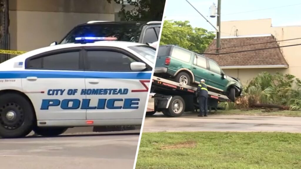 Coche policial y camioneta remolcada en accidente