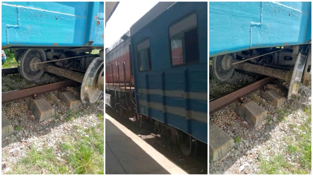 Tren descarrilado en las vías, ruedas desalineadas.