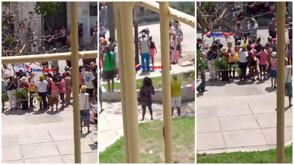 Grupo de personas reunidas en la calle.