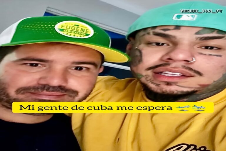 Dos personas con gorras, mensaje sobre Cuba.