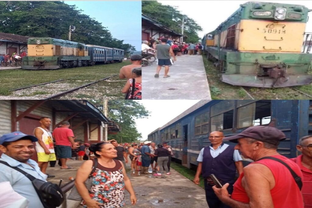 Estación de tren con pasajeros esperando en el andén.
