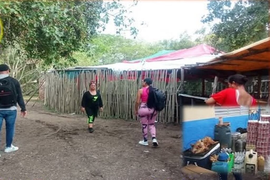 Personas caminando en entorno rural con cabaña