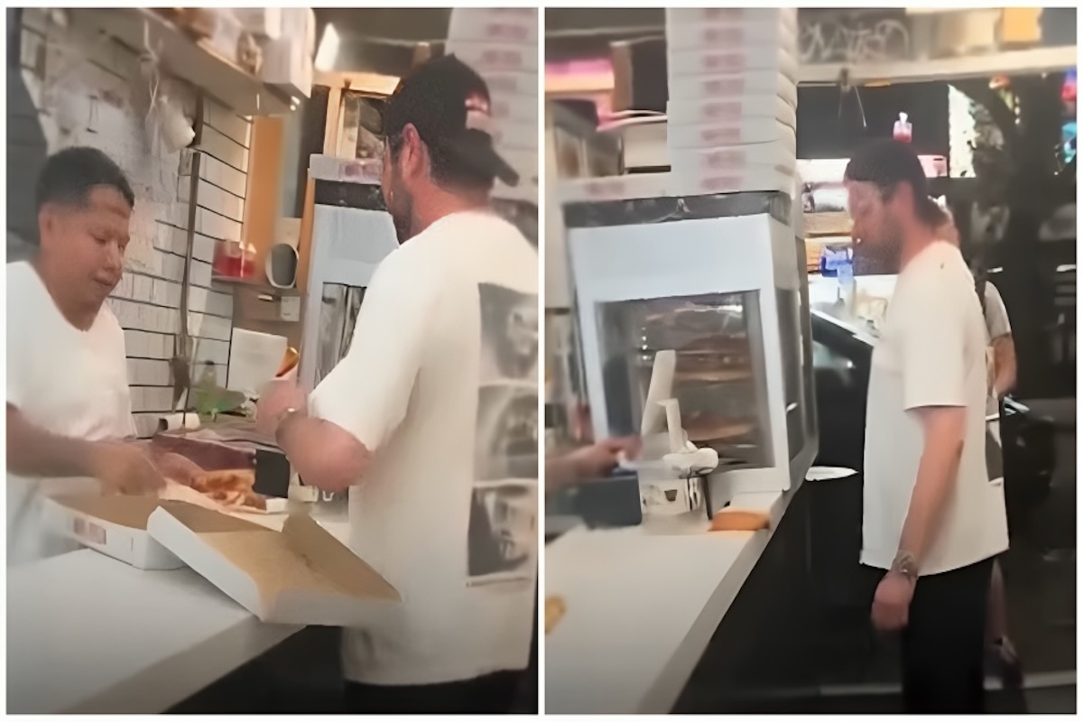 Hombre comprando pizza en tienda.