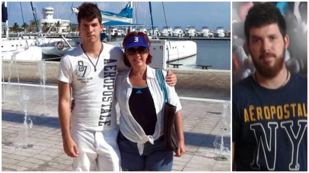 Dos personas en puerto; hombre solo, sonriente.