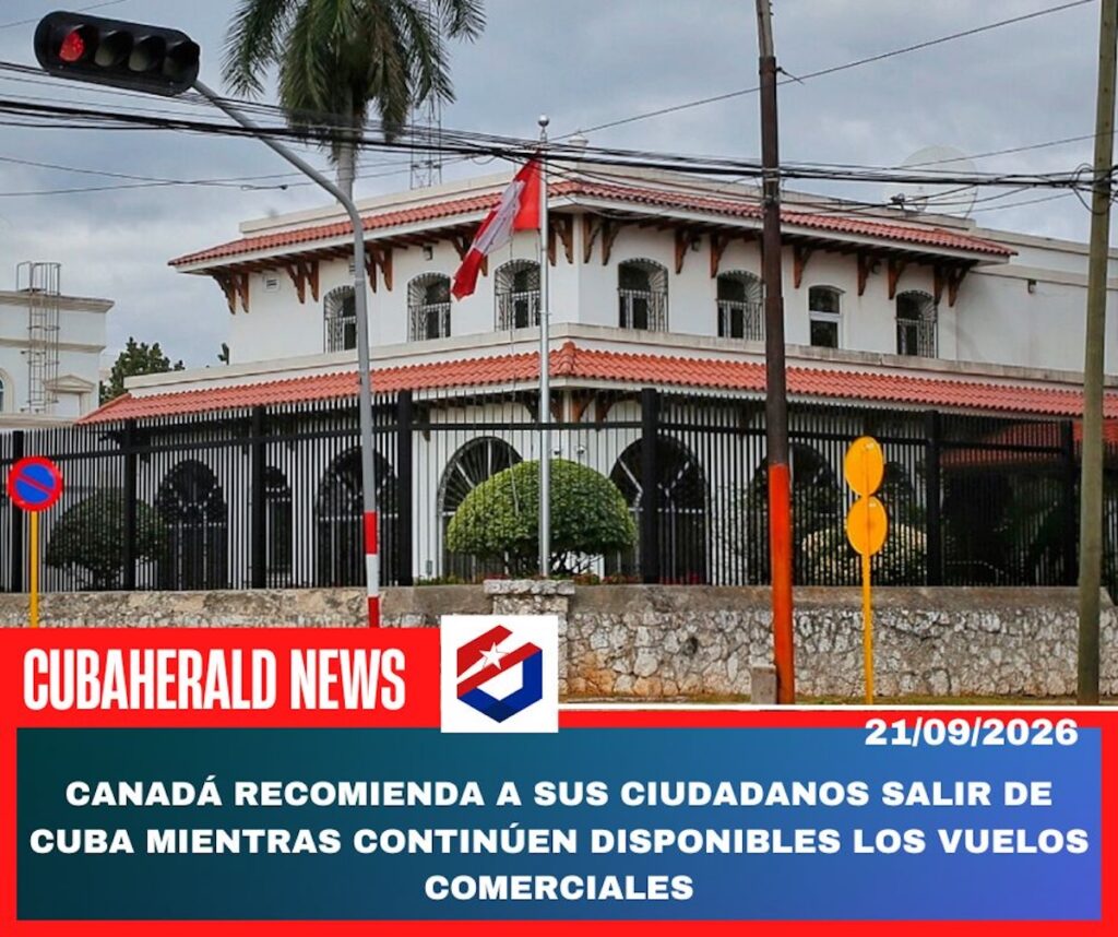 Edificio con titular sobre recomendación de Canadá para abandonar Cuba.
